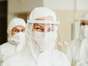 Nurses in protective suits